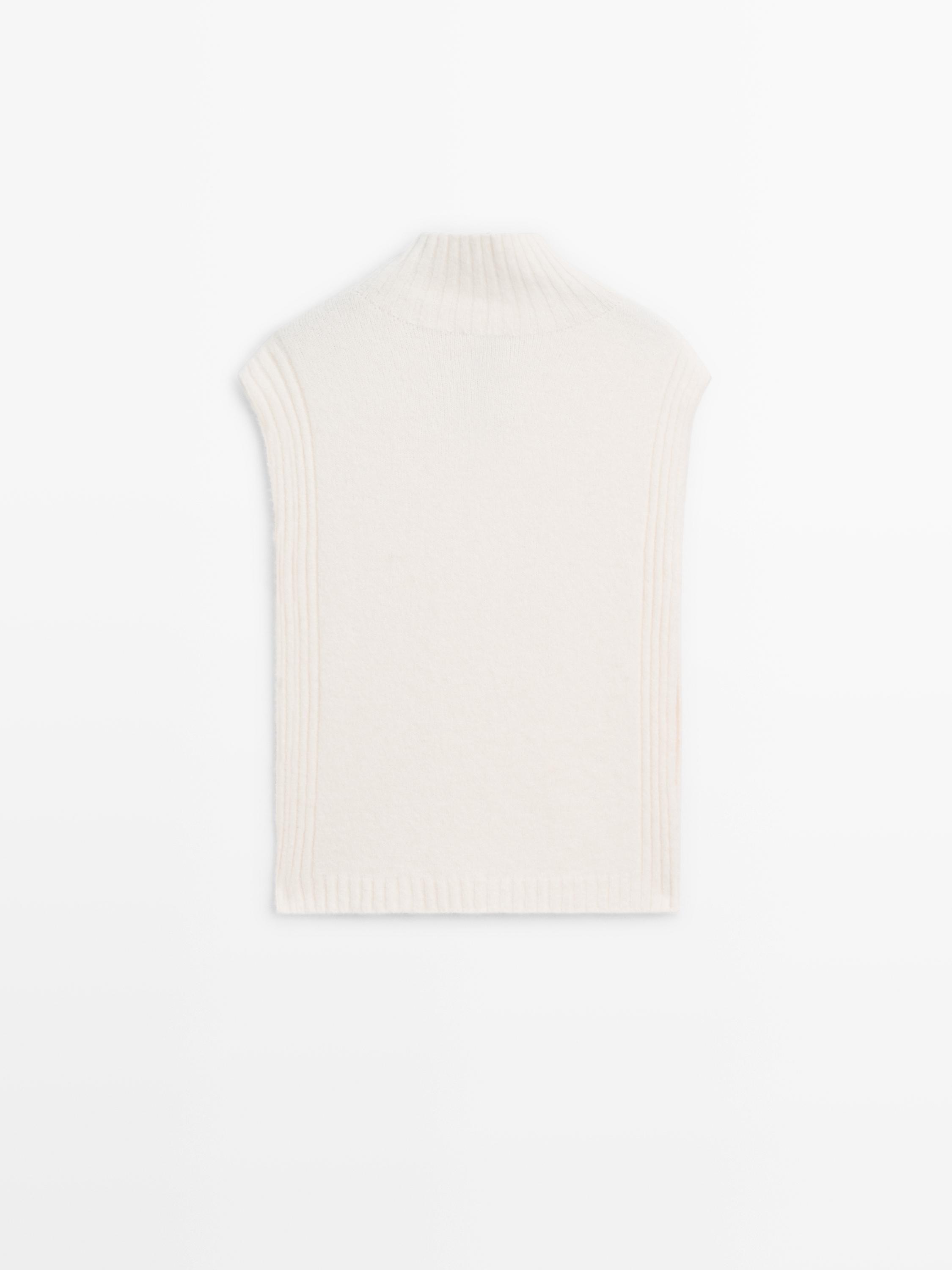 Sleeveless high neck sweater